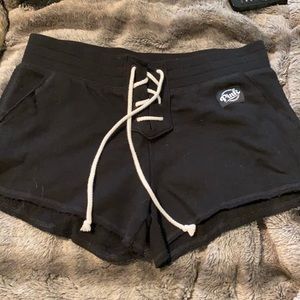 pink black shorts